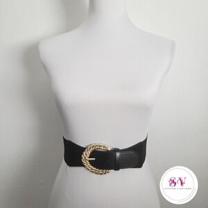 Black belt with gold buckle and braided design